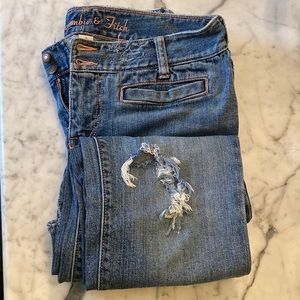 Vintage A&F, Bootcut, Low-rise, Destroyed, Button/Zip, straight pockets.